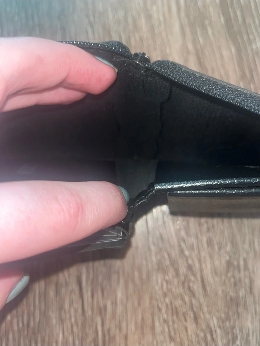 split Black Leather Zip-Around Wallet with Gold Accents